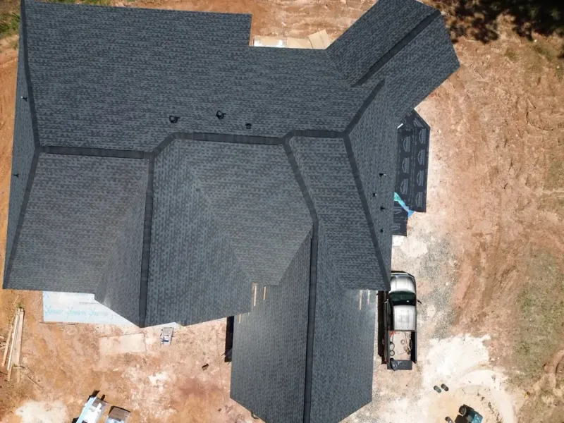 Best Dunwoody Roofer team performing a free roof inspection on a residential home in Dunwoody, GA